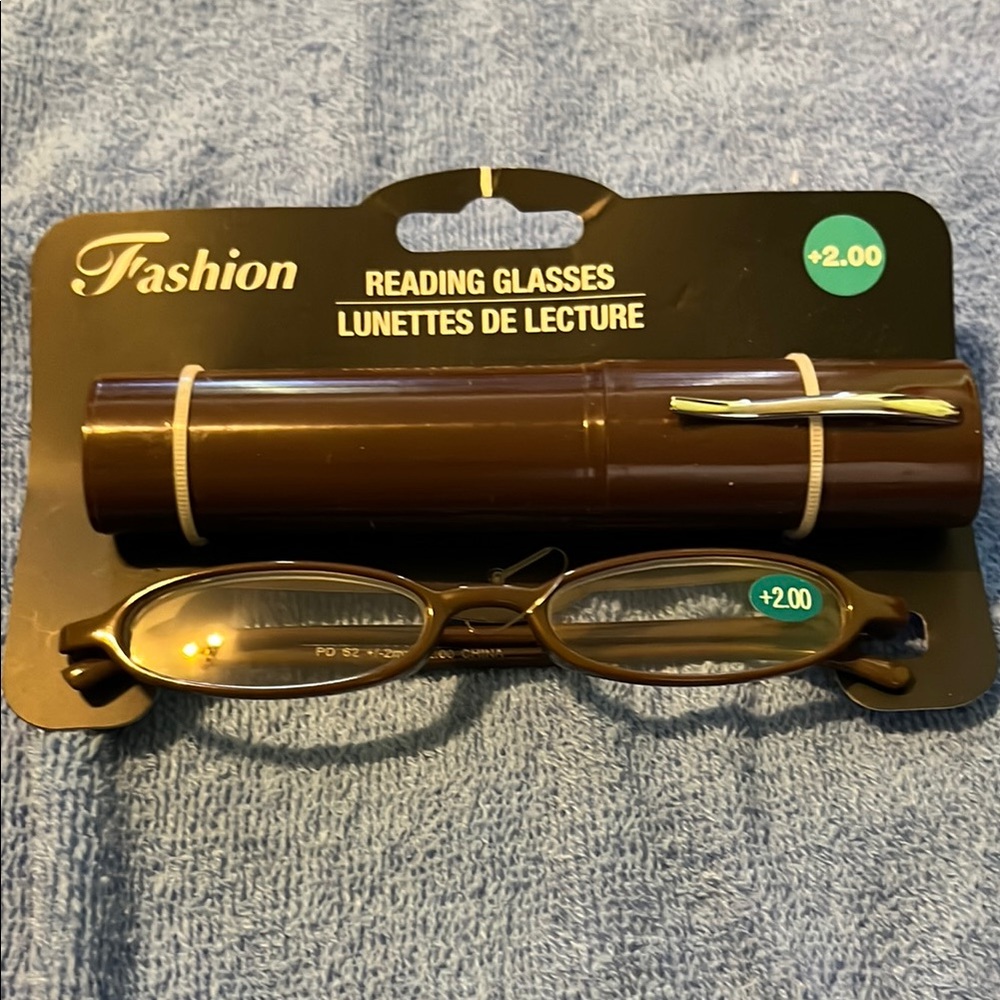 Reading Glasses +2.00. Small frame never been used.